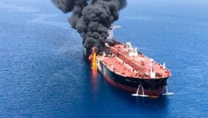 Why would Iran attack two tankers near the Strait of Hormuz?