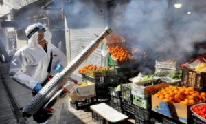 Virus cases top 100,000 cases as economic impact snowballs