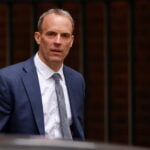 Britain’s Foreign Secretary Raab walks outside Downing Street in London