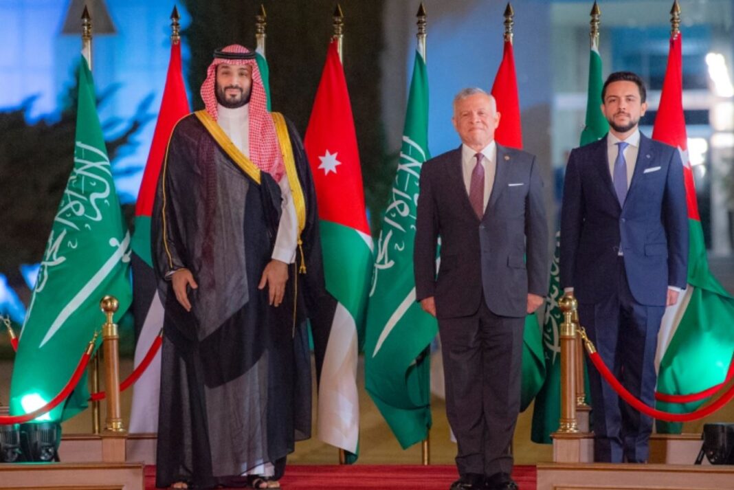 Saudi Crown Prince Mohammed bin Salman, left, King Abdullah II of Jordan, centre, and his son, Crown Prince Hussein bin Abdullah, at Queen Alia International Airport in Amman, Jordan.