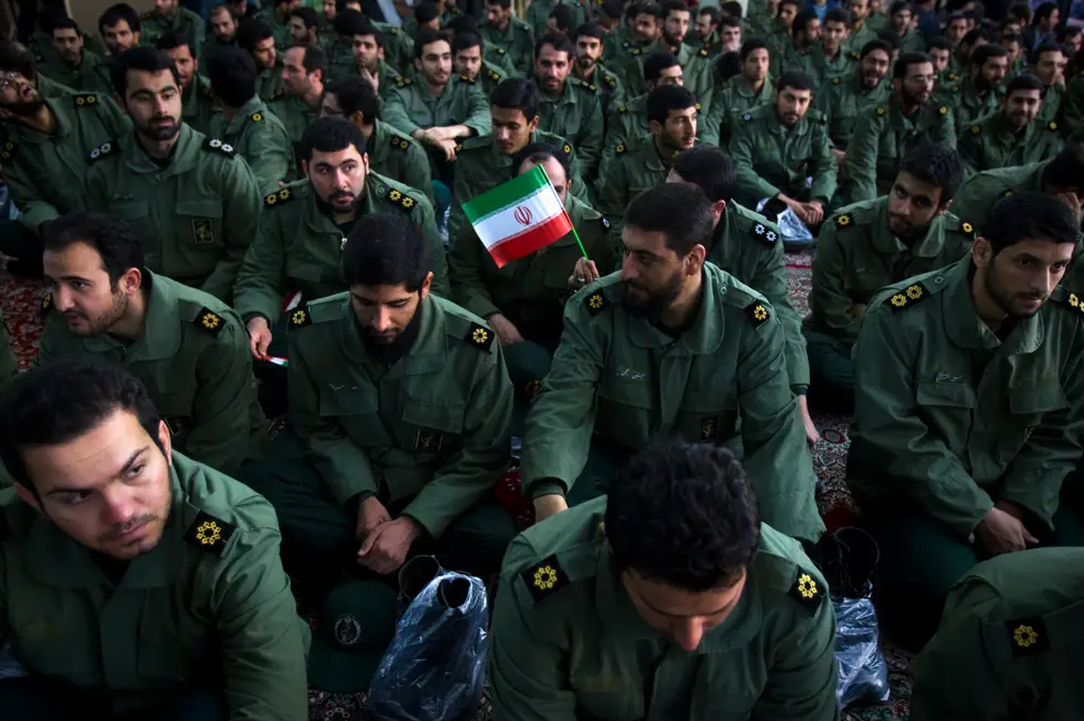 Members of Iran's IRGC attend the anniversary ceremony of Iran's Islamic Revolution at the Khomeini shrine in the Behesht Zahra cemetery, south of Tehran, February 1, 2012.