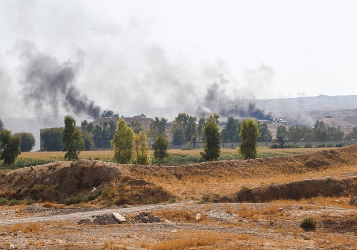 Smoke rises from the Iraqi Kurdistan headquarters of the Kurdish Democratic Party of Iran, after Iran's IRGC missile strike on the outskirts of Kirkuk, Iraq September 28,